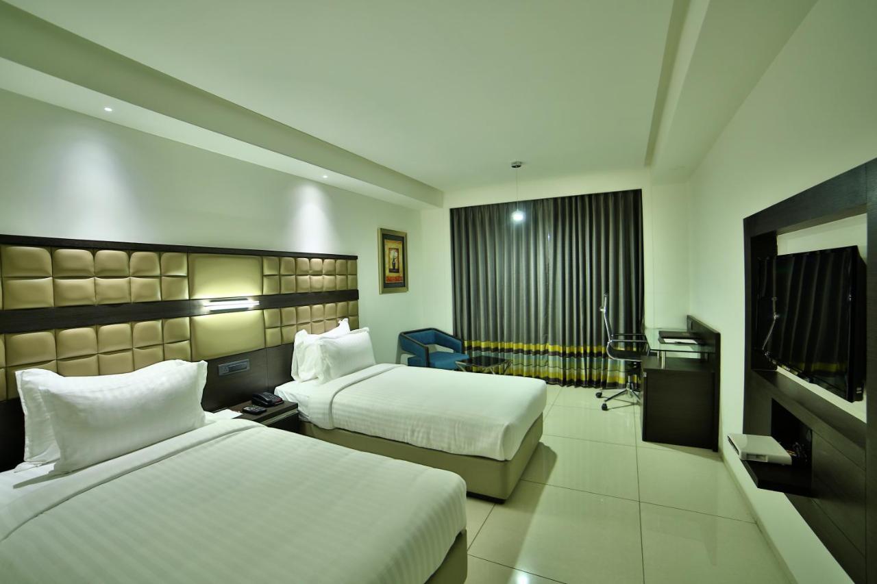 Hotel G Express Formerly Known As Tgb Express Ahmedabad Exterior foto