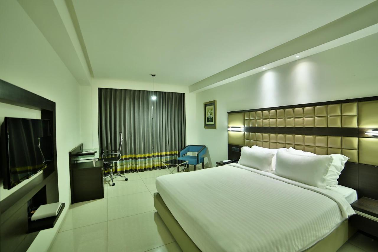 Hotel G Express Formerly Known As Tgb Express Ahmedabad Exterior foto