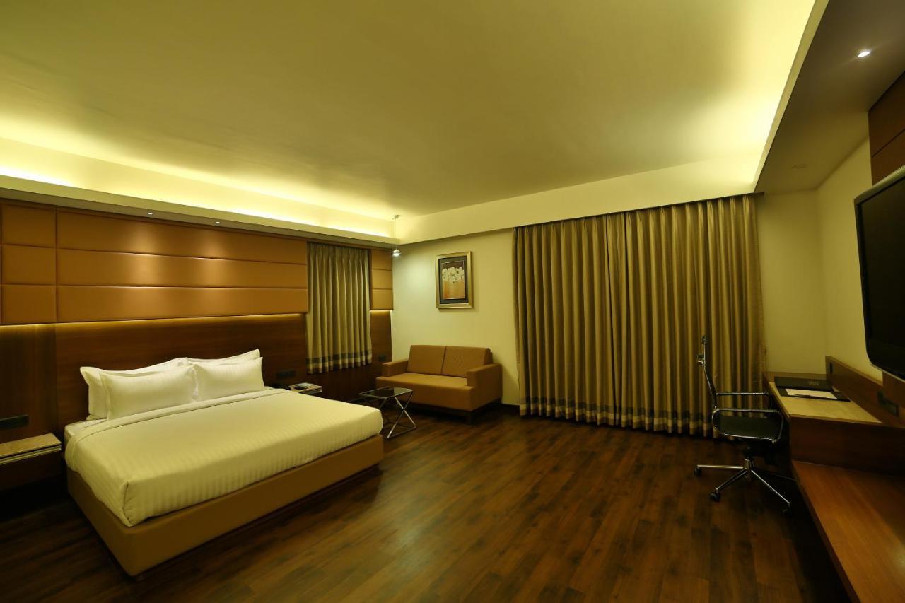 Hotel G Express Formerly Known As Tgb Express Ahmedabad Exterior foto